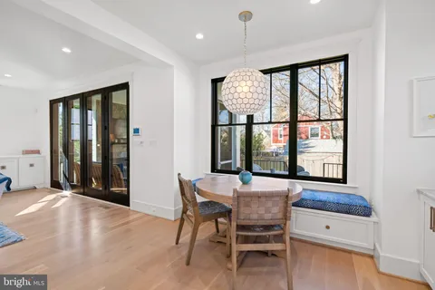 a bedroom with a bed and chair