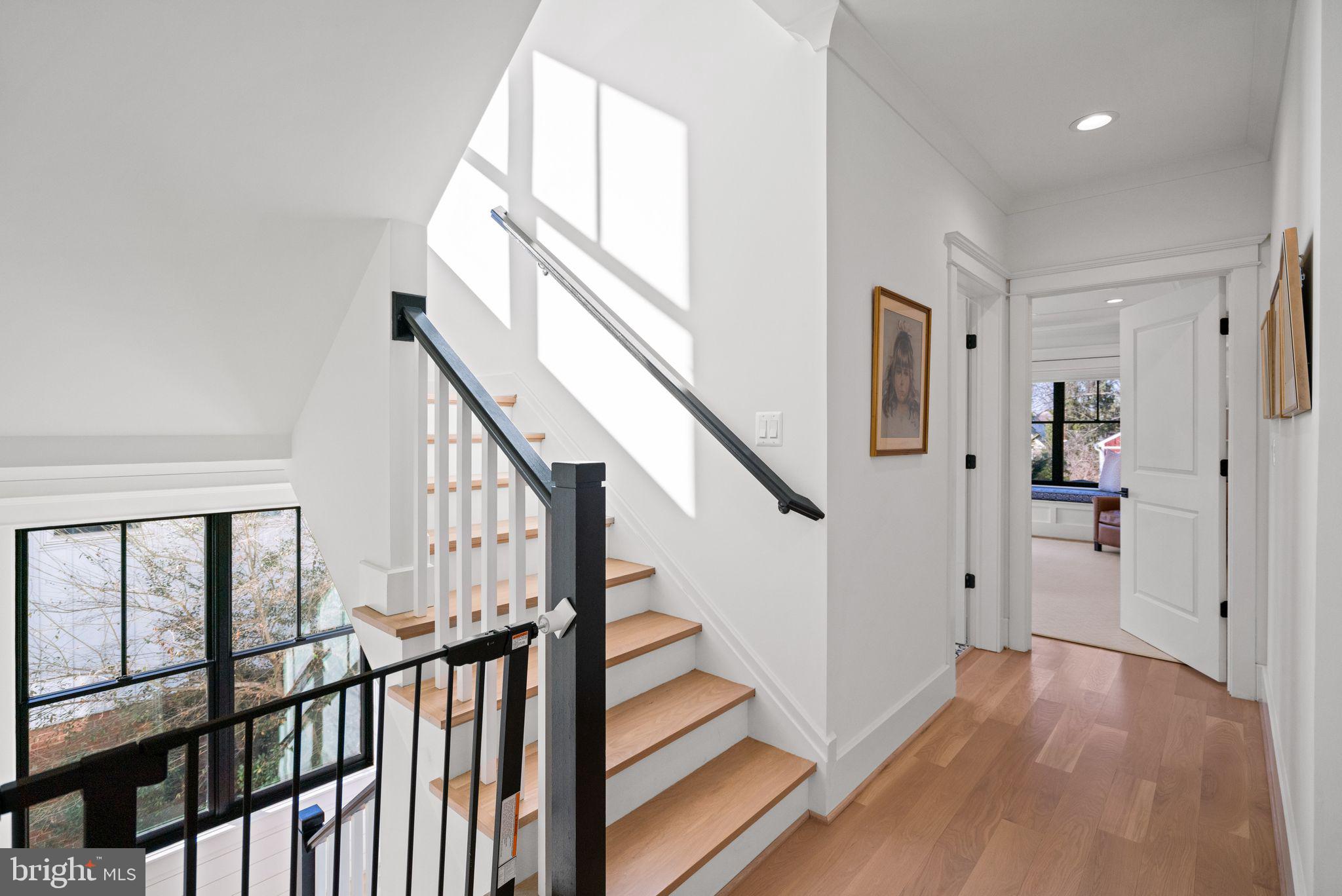 4529 Rosedale Avenue Bethesda, MD 20814 - Photo 51 of 123 a view of an entryway with wooden floor and door