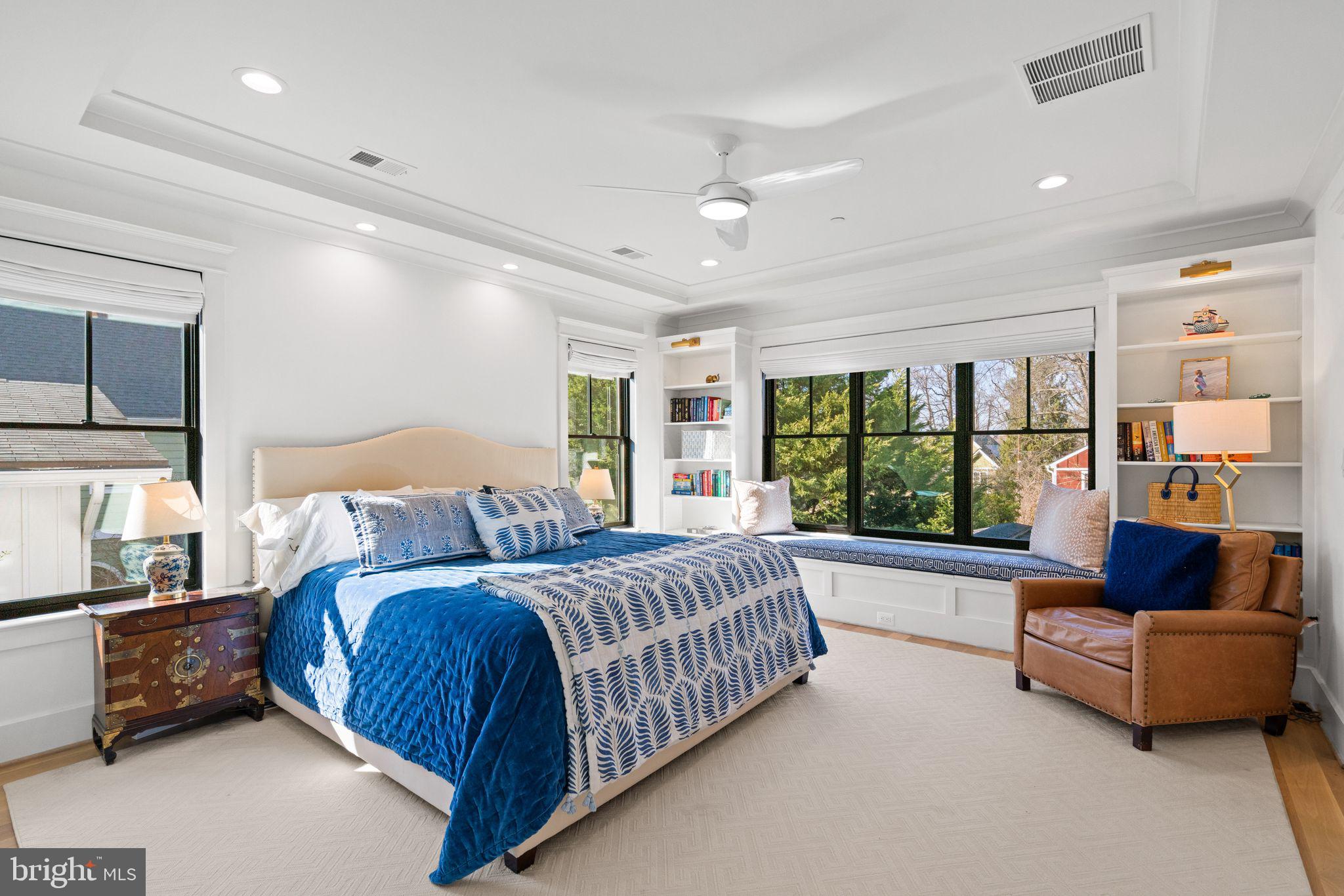 4529 Rosedale Avenue Bethesda, MD 20814 - Photo 52 of 123 a spacious bedroom with a bed and glass window