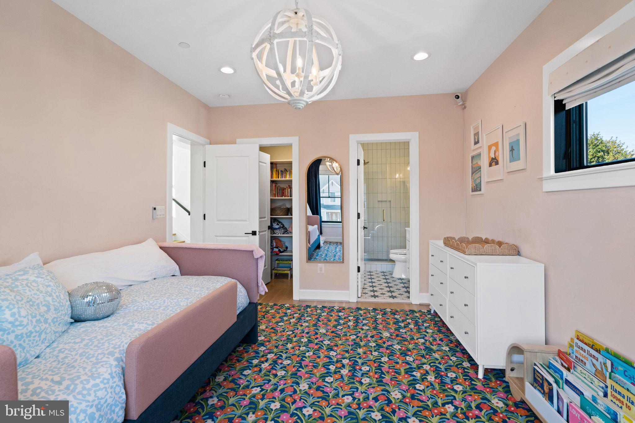 4529 Rosedale Avenue Bethesda, MD 20814 - Photo 74 of 123 a bedroom with furniture and a chandelier