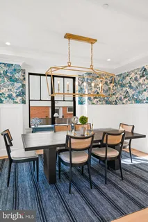 a living room with furniture fireplace and flat screen tv