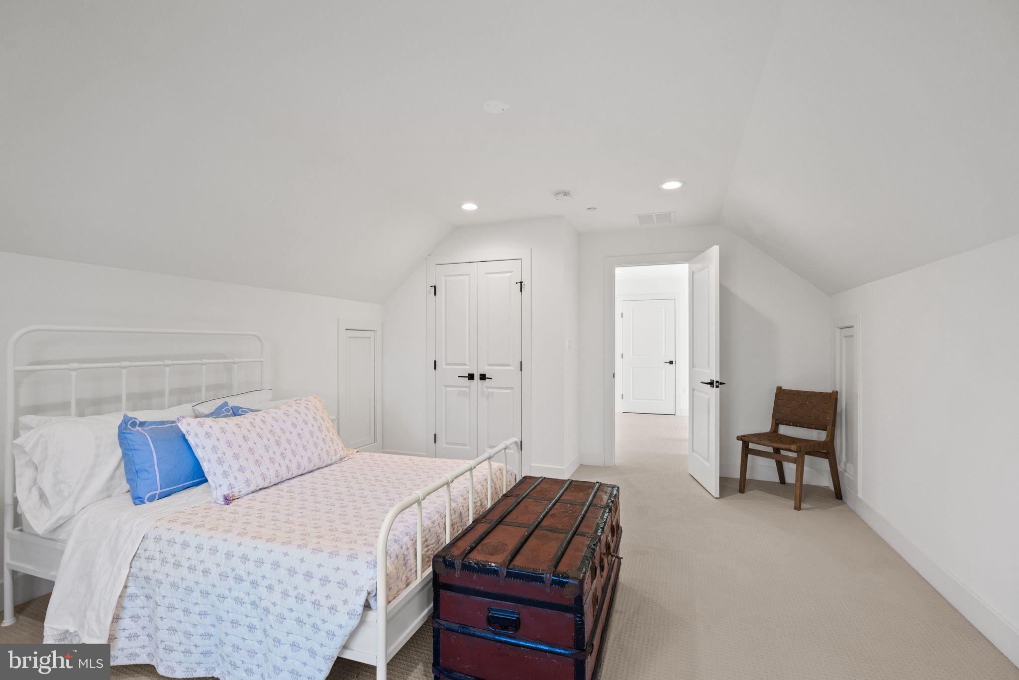 4529 Rosedale Avenue Bethesda, MD 20814 - Photo 96 of 123 a bedroom with a bed and chair