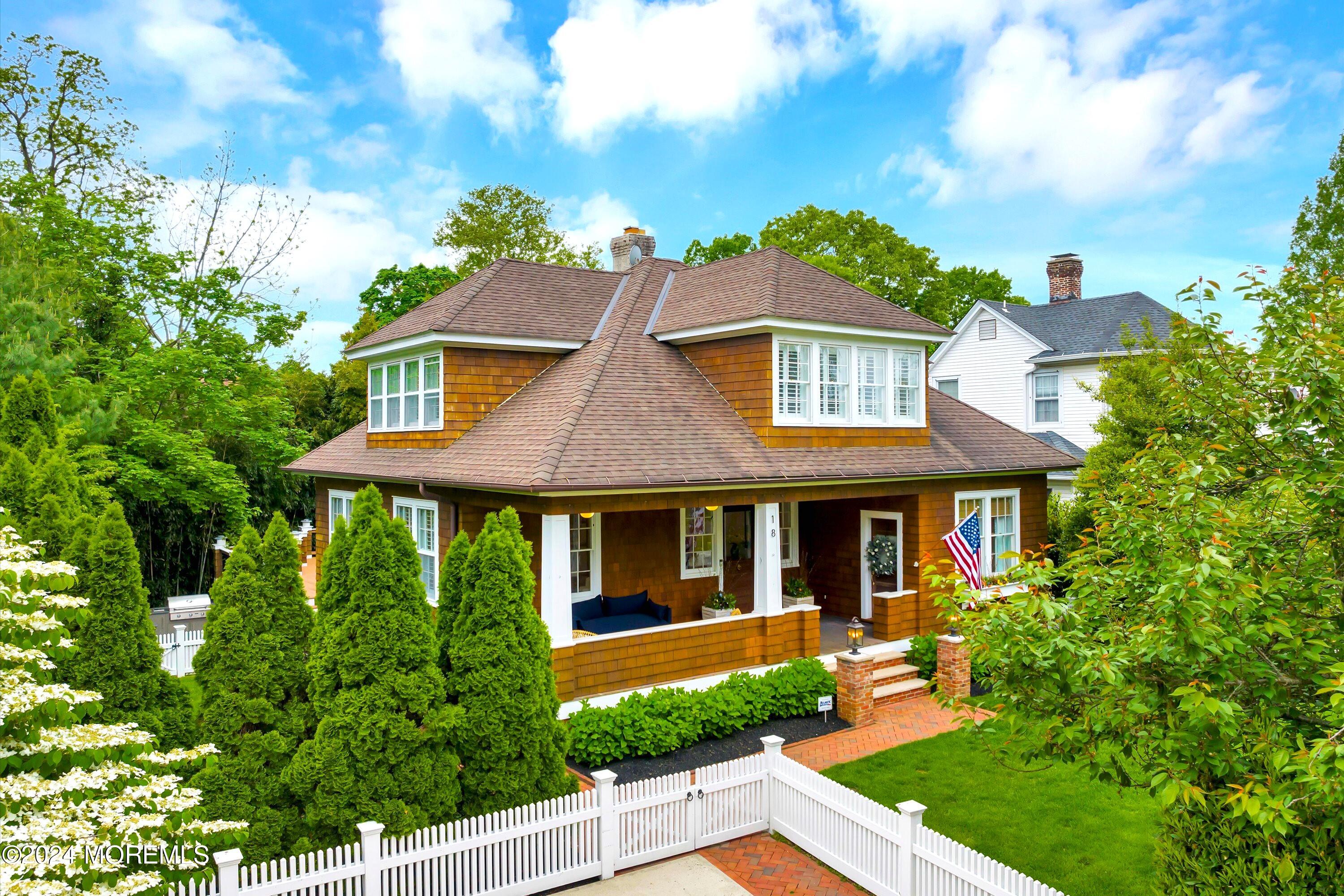 18 Hubbard Park Red Bank, NJ 07701 - Photo 1 of 54 a front view of a house with a yard