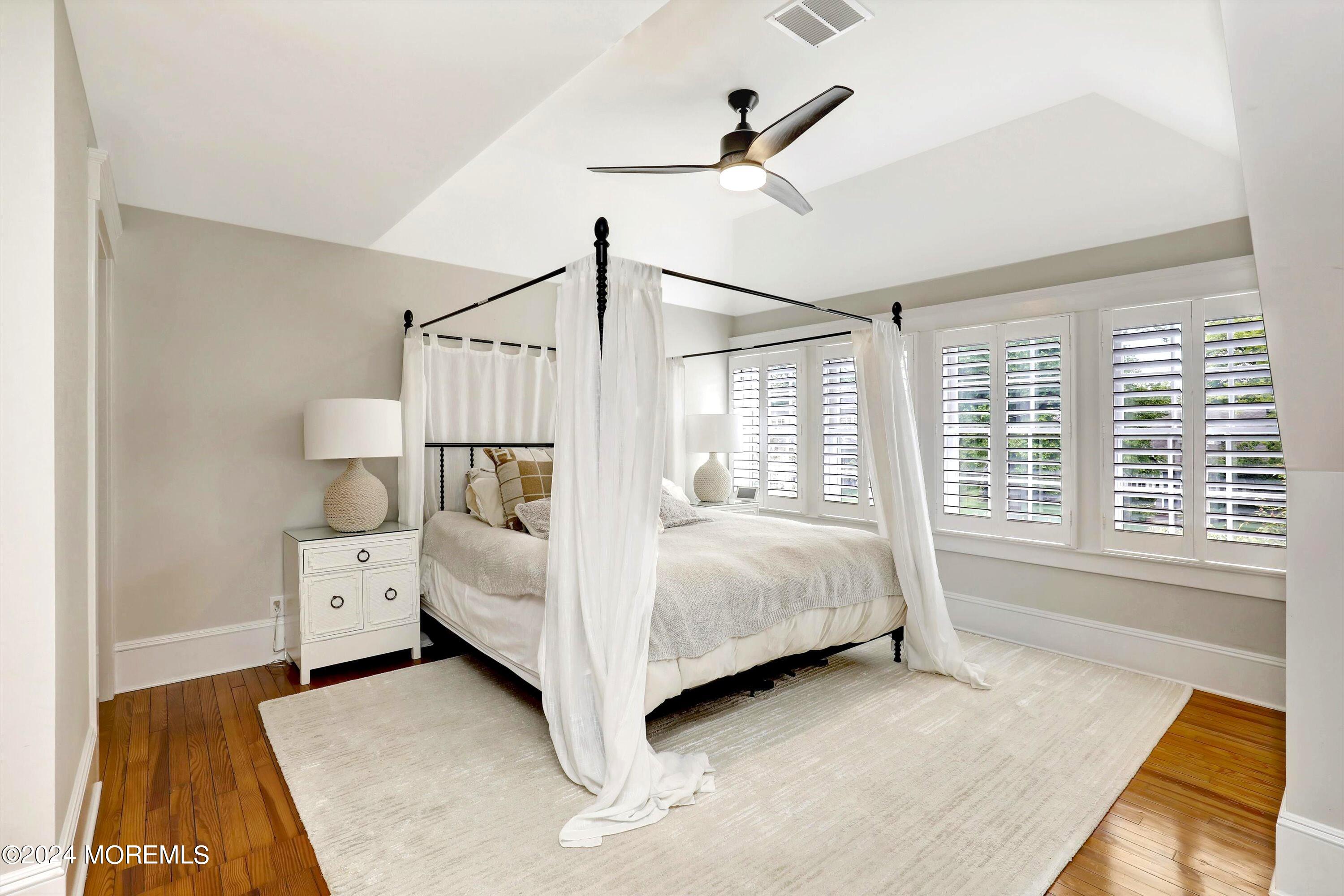 18 Hubbard Park Red Bank, NJ 07701 - Photo 22 of 54 a bedroom with a white bed and white walls