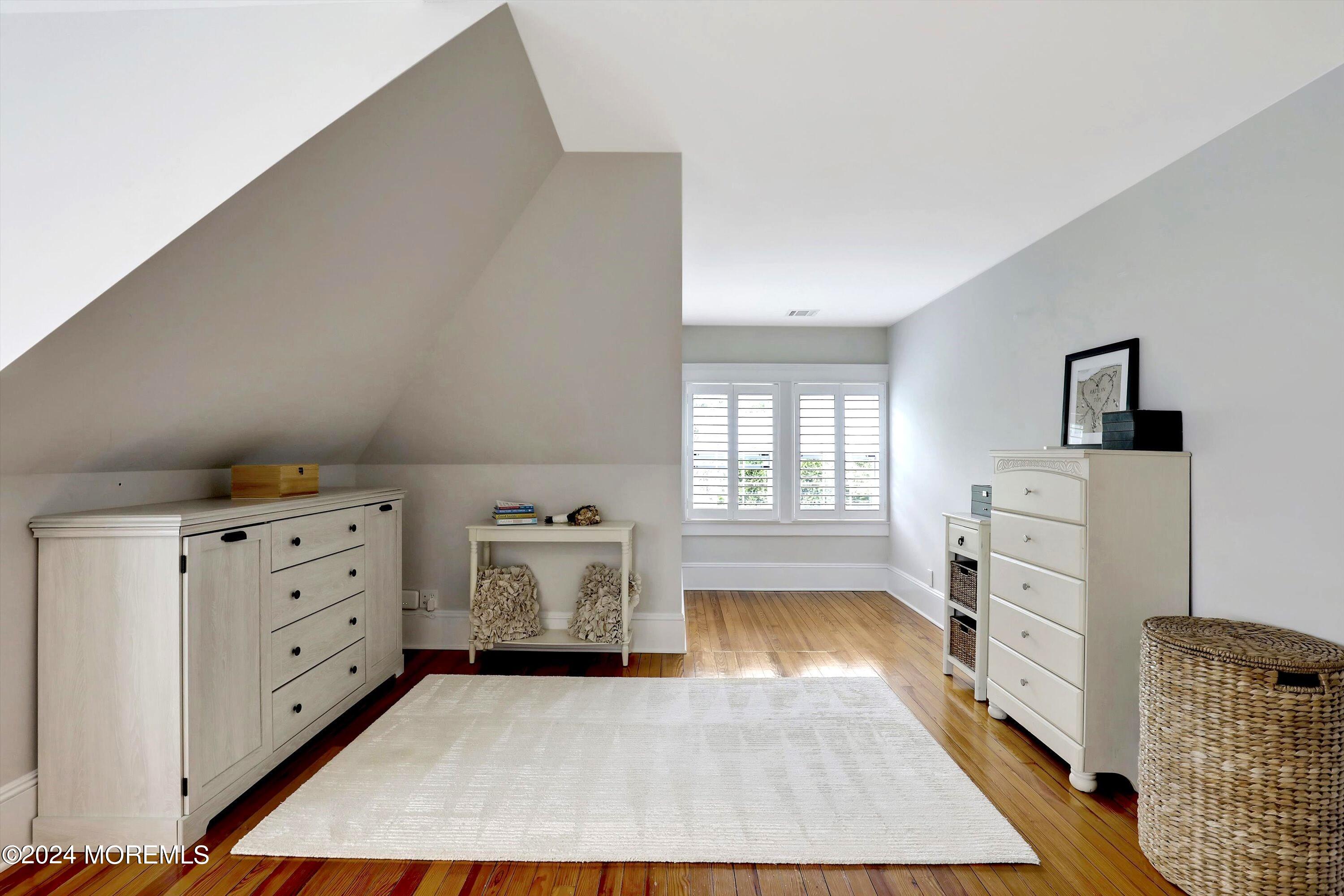 18 Hubbard Park Red Bank, NJ 07701 - Photo 25 of 54 a room with furniture and a dresser
