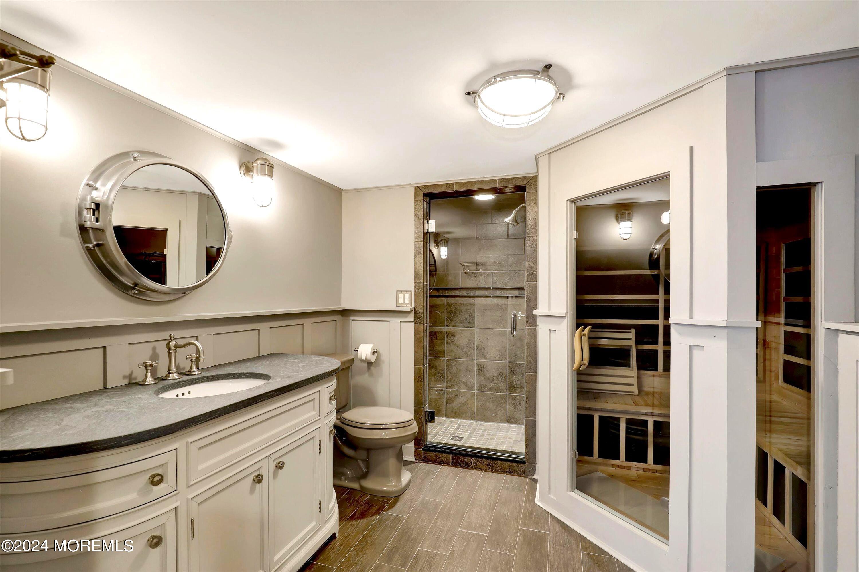 18 Hubbard Park Red Bank, NJ 07701 - Photo 35 of 54 a bathroom with a sink and a mirror
