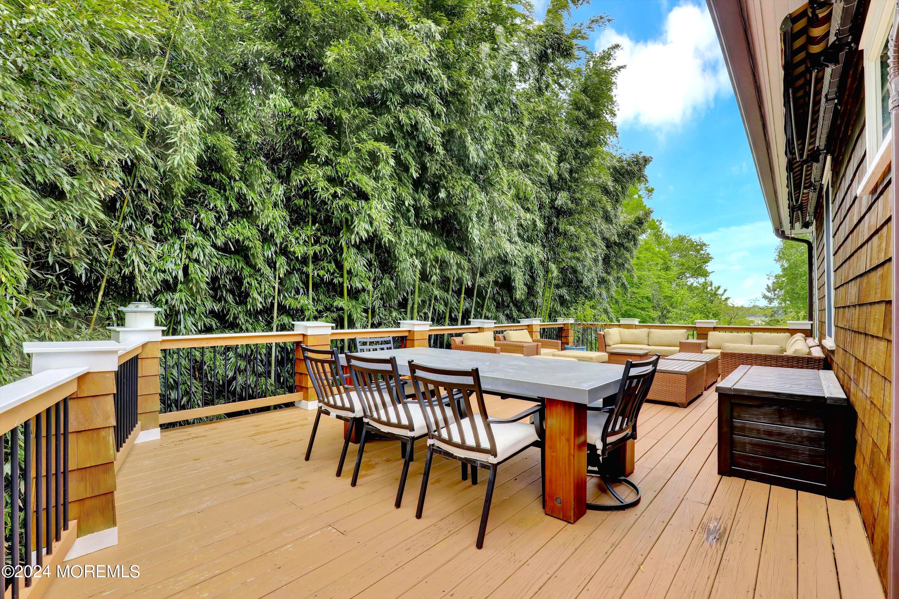 18 Hubbard Park Red Bank, NJ 07701 - Photo 38 of 54 a terrace with outdoor seating and wooden floor