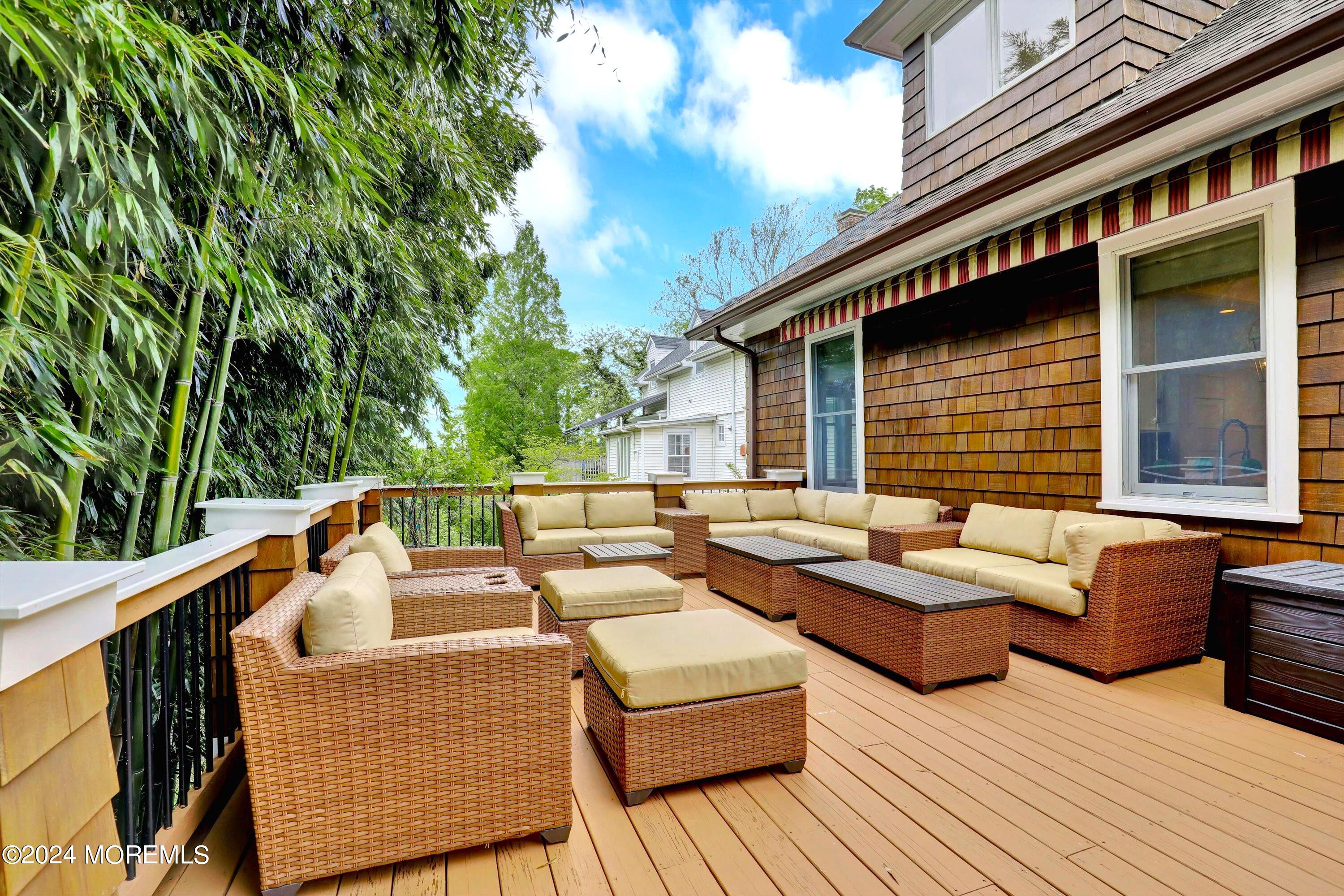18 Hubbard Park Red Bank, NJ 07701 - Photo 39 of 54 a patio with patio a couch and chairs