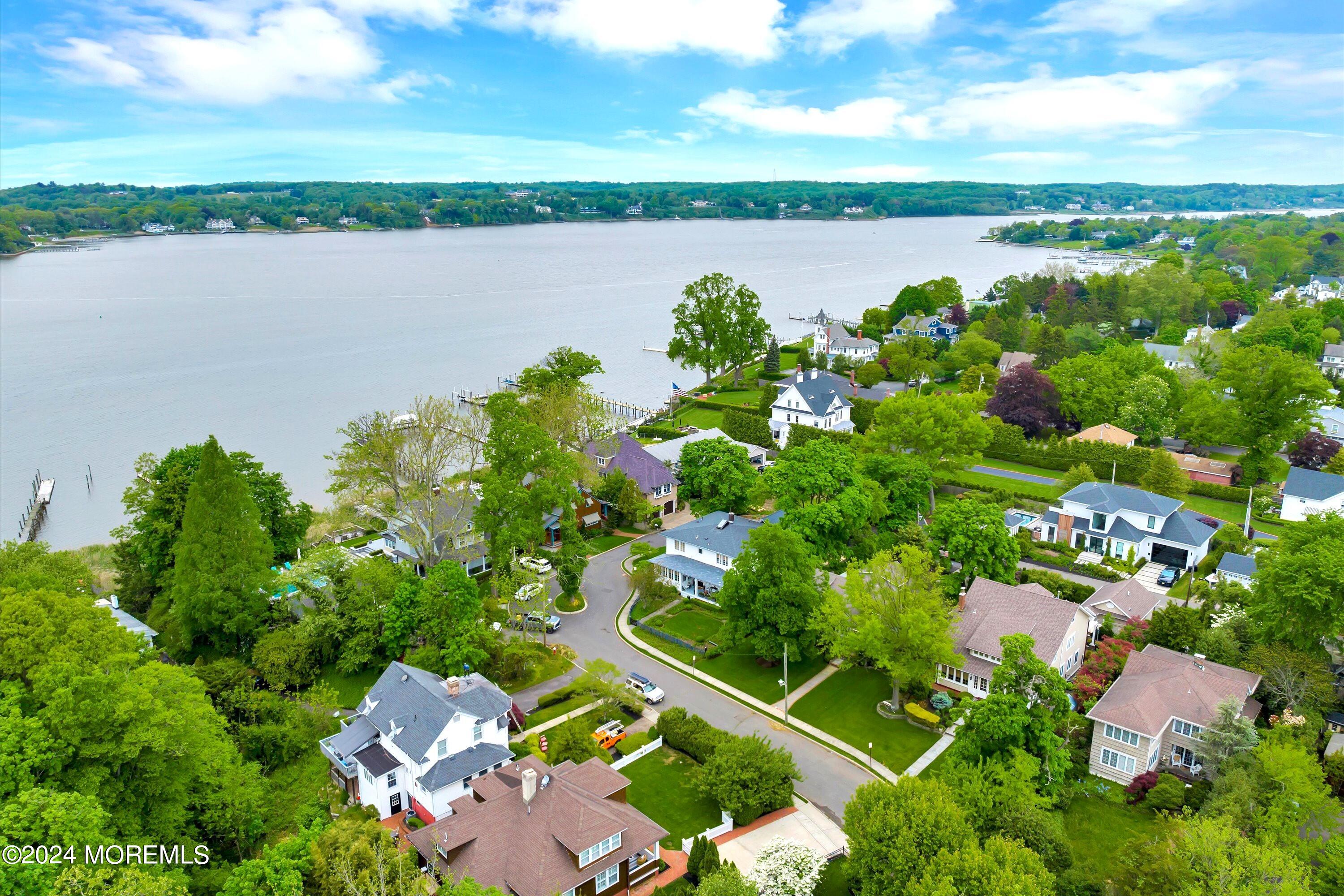 18 Hubbard Park Red Bank, NJ 07701 - Photo 4 of 54 a view of a lake with a city