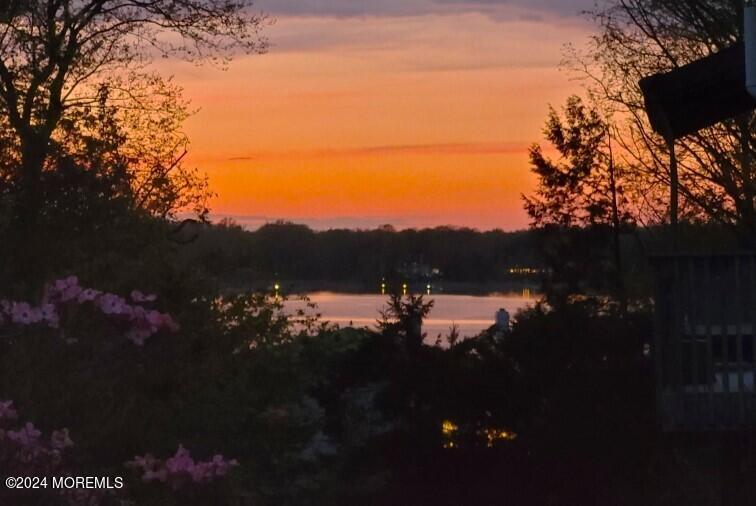 18 Hubbard Park Red Bank, NJ 07701 - Photo 47 of 54 a view of a lake in a sunset
