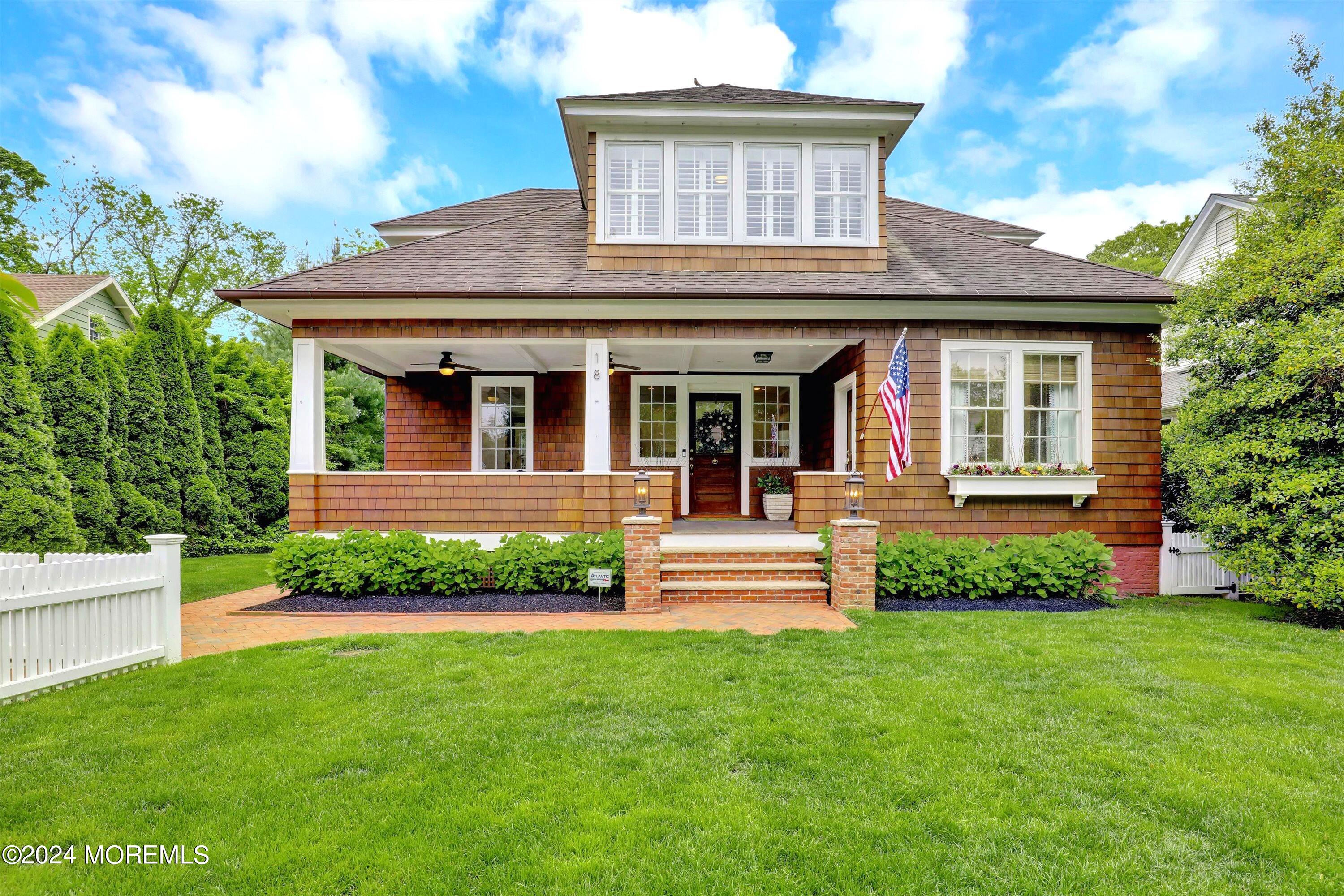 18 Hubbard Park Red Bank, NJ 07701 - Photo 5 of 54 a front view of a house with a yard