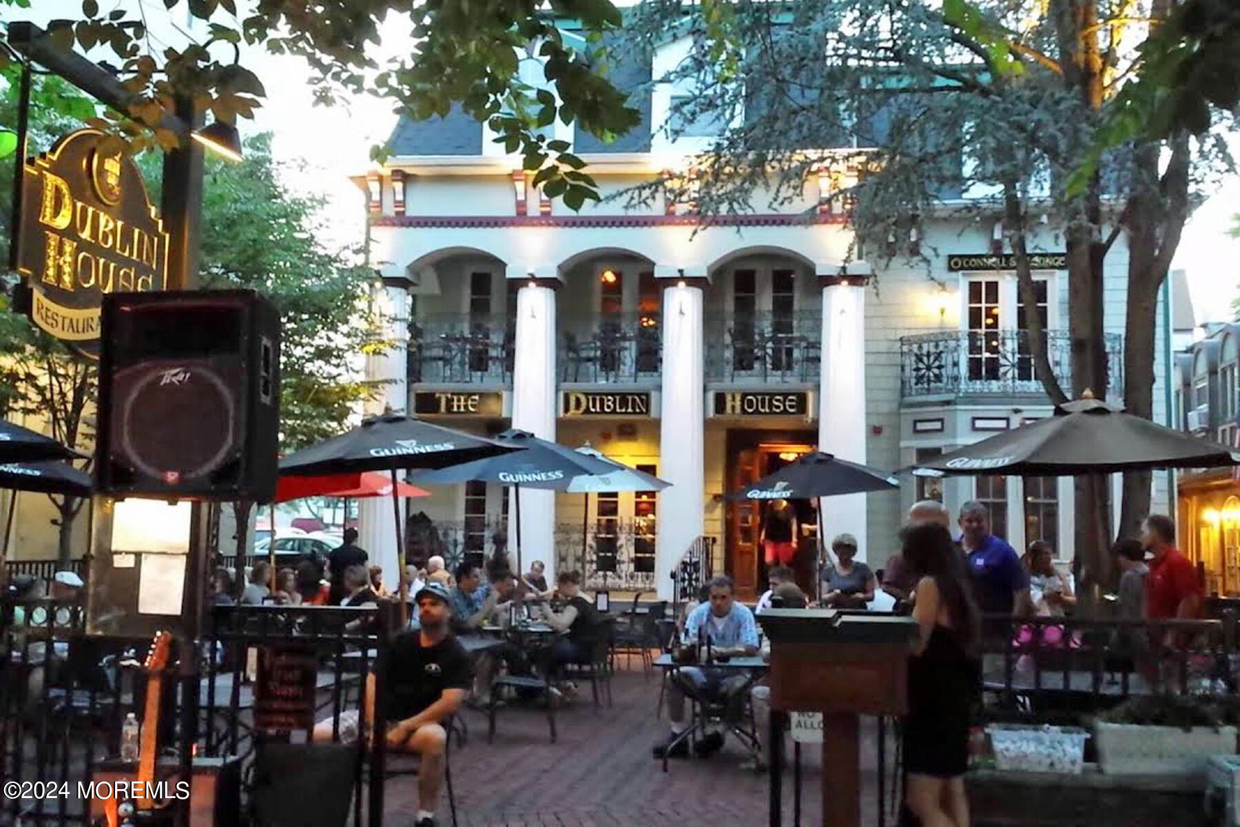 18 Hubbard Park Red Bank, NJ 07701 - Photo 51 of 54 a view of a cafe with a table and chairs in front of it