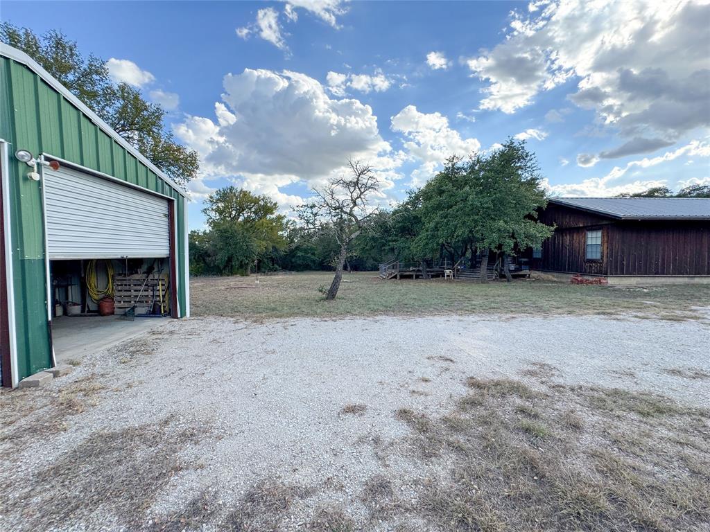 801 Highway 2214 Ranger, TX 76470 - Photo 34 of 40 a view of a house with a backyard