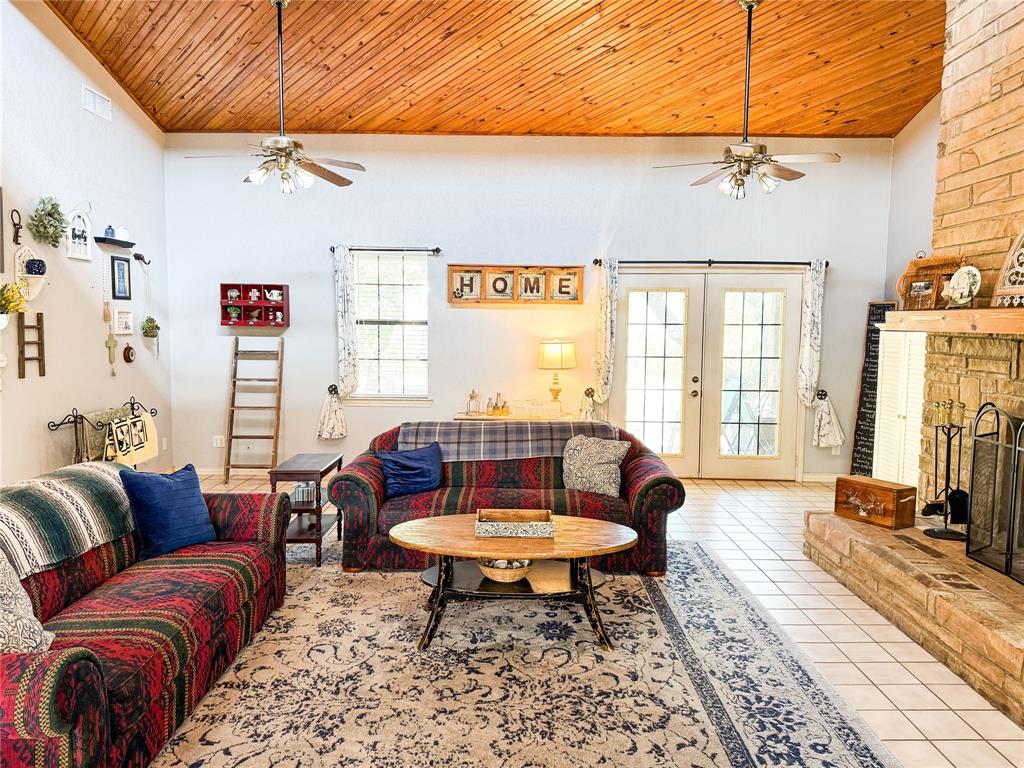 801 Highway 2214 Ranger, TX 76470 - Photo 8 of 40 a living room with furniture a rug and a table