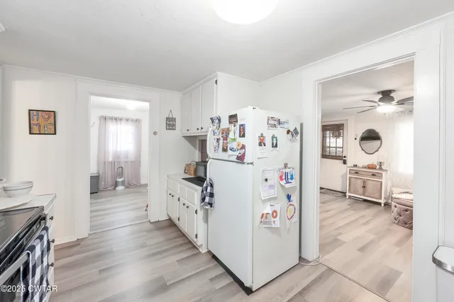 a room with furniture and a wooden floor