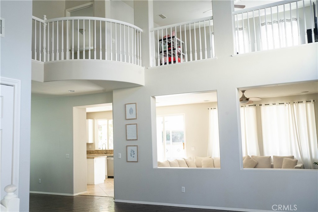 36719 Torrey Pines Drive Beaumont, CA 92223 - Photo 17 of 56 a view of an entryway with wooden floor