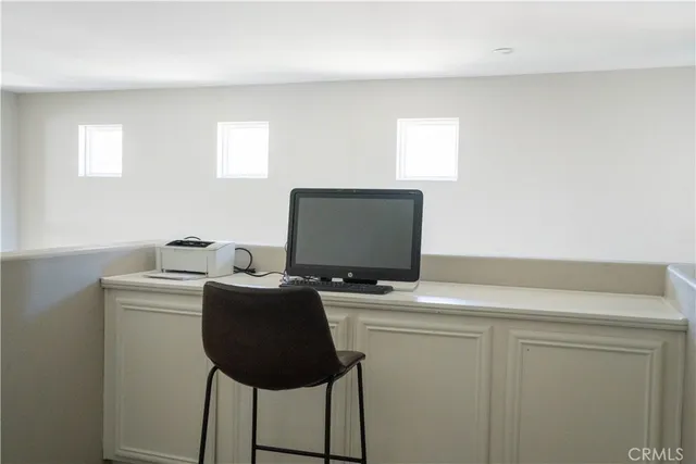 a view of a room with table and chair