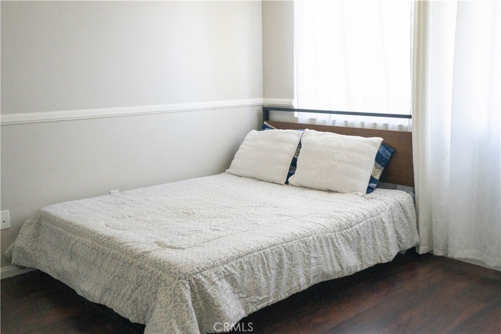 36719 Torrey Pines Drive Beaumont, CA 92223 - Photo 38 of 56 a bedroom with a bed and window