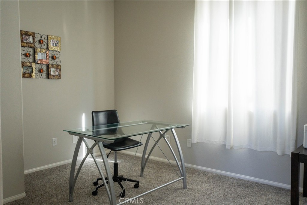 36719 Torrey Pines Drive Beaumont, CA 92223 - Photo 39 of 56 a view of a room with table and chair