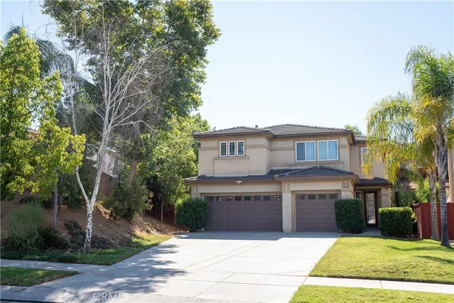a view of entryway with wooden floor and stairs