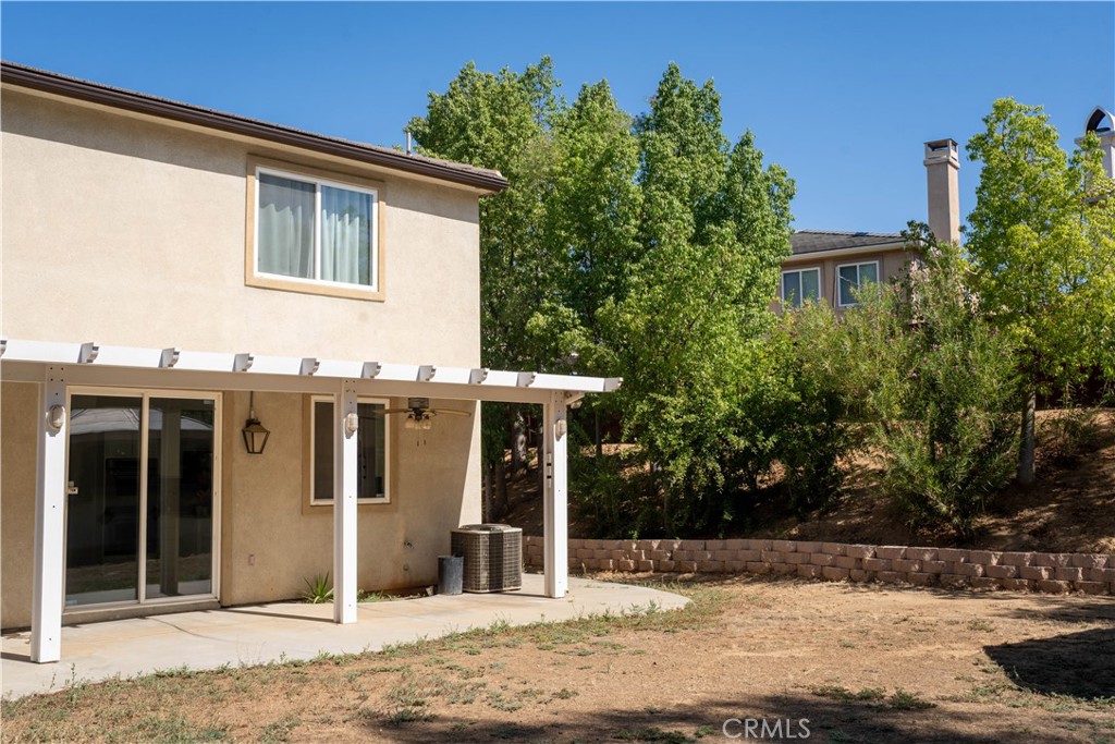 36719 Torrey Pines Drive Beaumont, CA 92223 - Photo 52 of 56 a view of a house with a yard