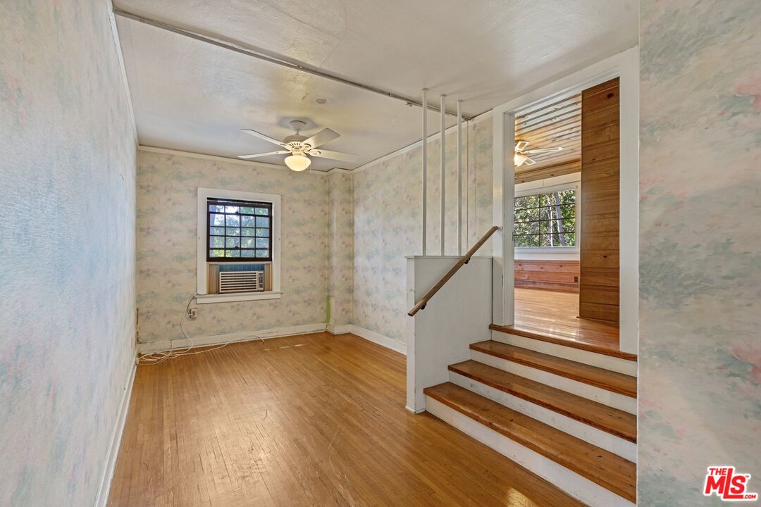 2429 North Commonwealth Avenue Los Angeles, CA 90027 - Photo 33 of 54 a view of an entryway with wooden floor and a window