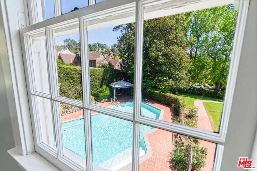 2429 North Commonwealth Avenue Los Angeles, CA 90027 - Photo 44 of 54 a view of a glass door with a from a window