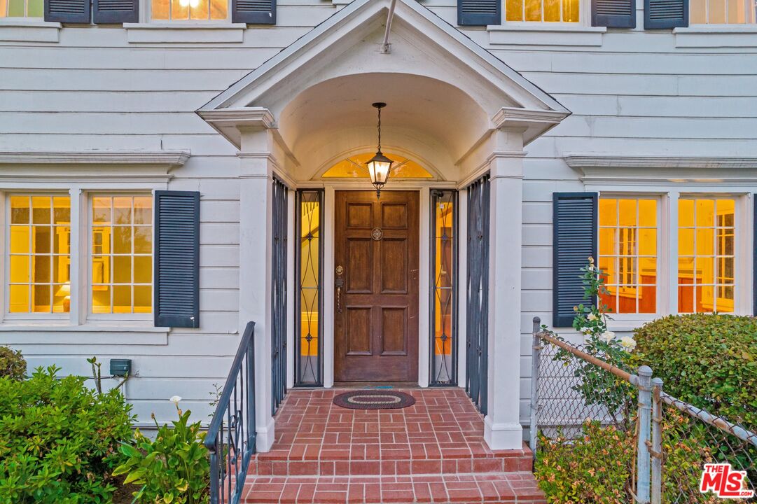2429 North Commonwealth Avenue Los Angeles, CA 90027 - Photo 6 of 54 a front view of a house with a porch