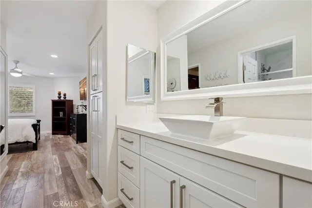 a kitchen with a sink and refrigerator