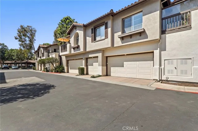 a front view of a building with a road