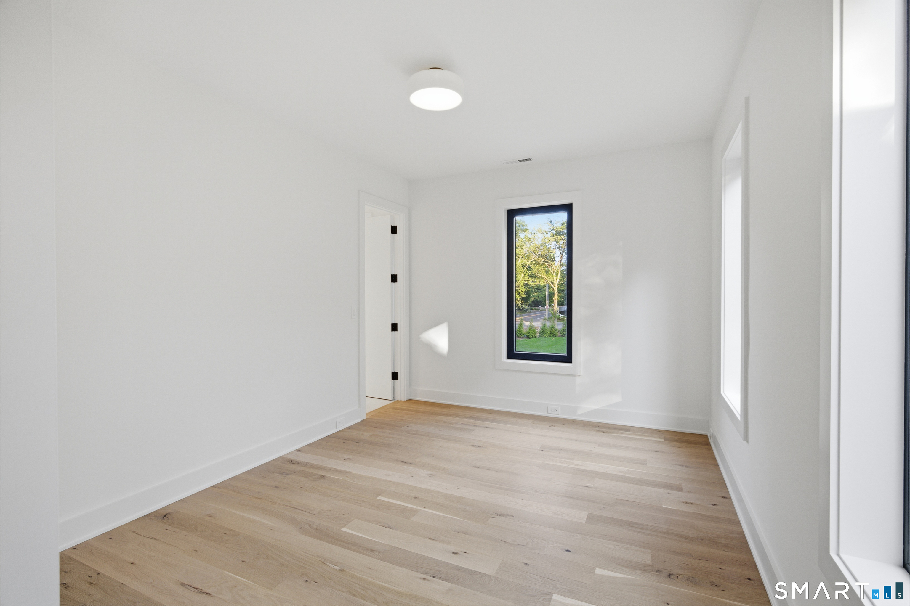 2 Windy Hill Road Westport, CT 06880 - Photo 29 of 40 an empty room with windows