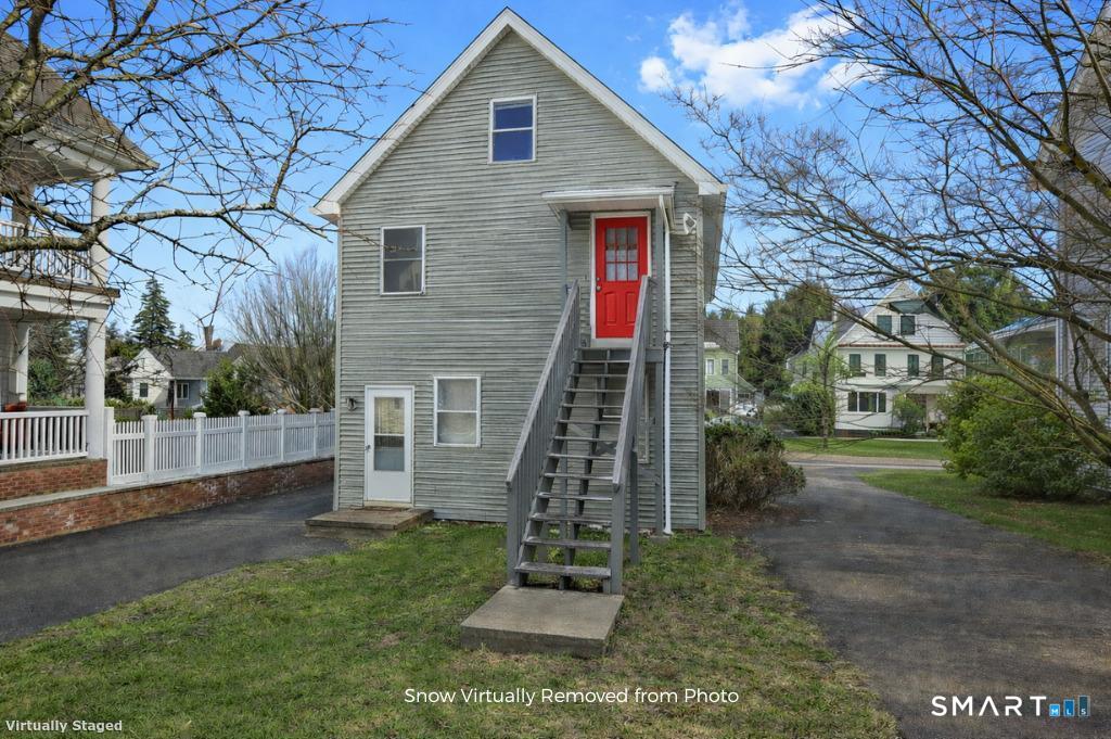 28 Orchard Place Greenwich, CT 06830 - Photo 3 of 13 Entrance to 2nd Floor rental via exterior stairs at rear of house. (Snow virtually removed from photo.)