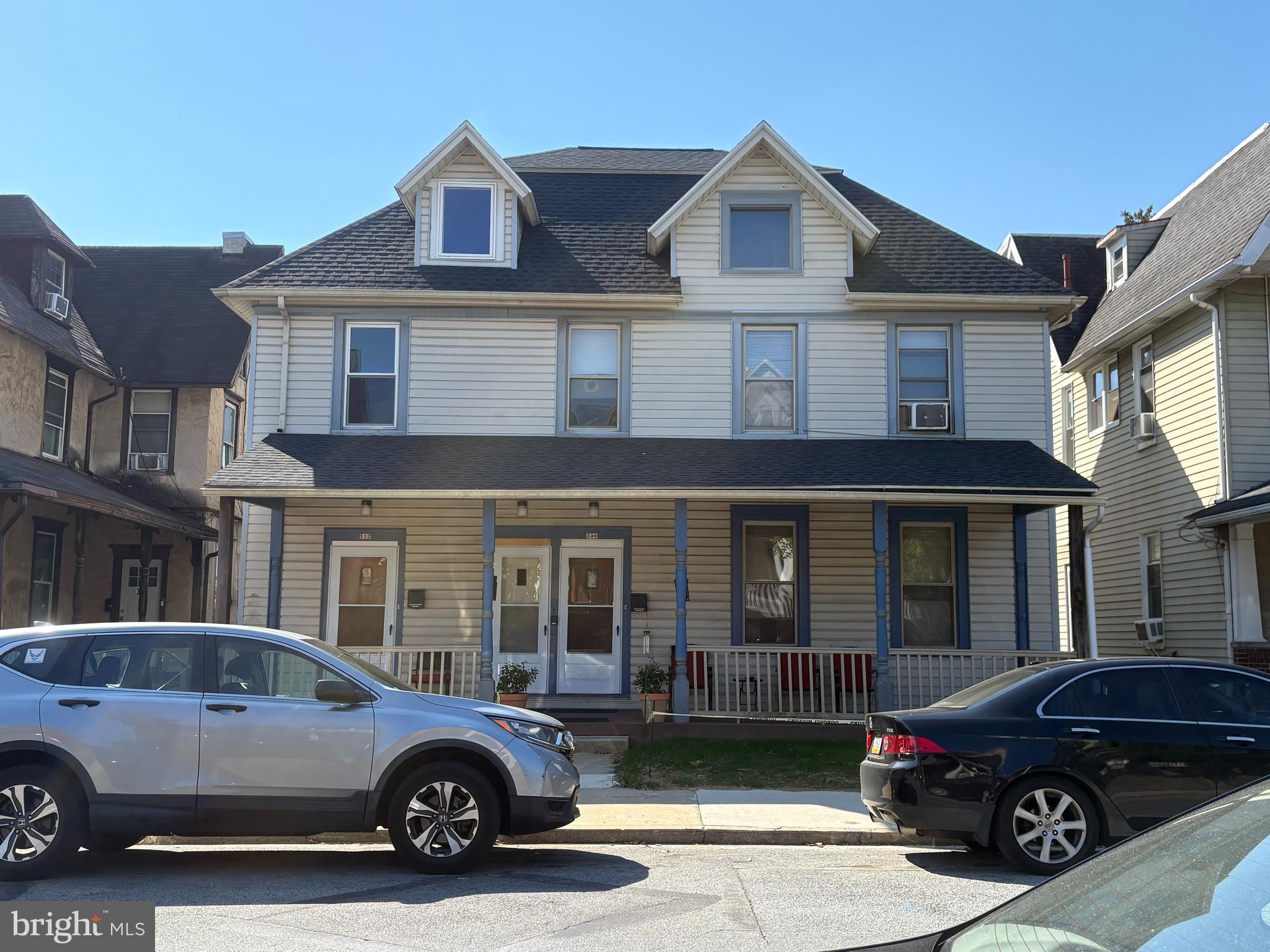 330 East Chestnut Street Coatesville, PA 19320 - Photo 1 of 17 a car parked in front of a house