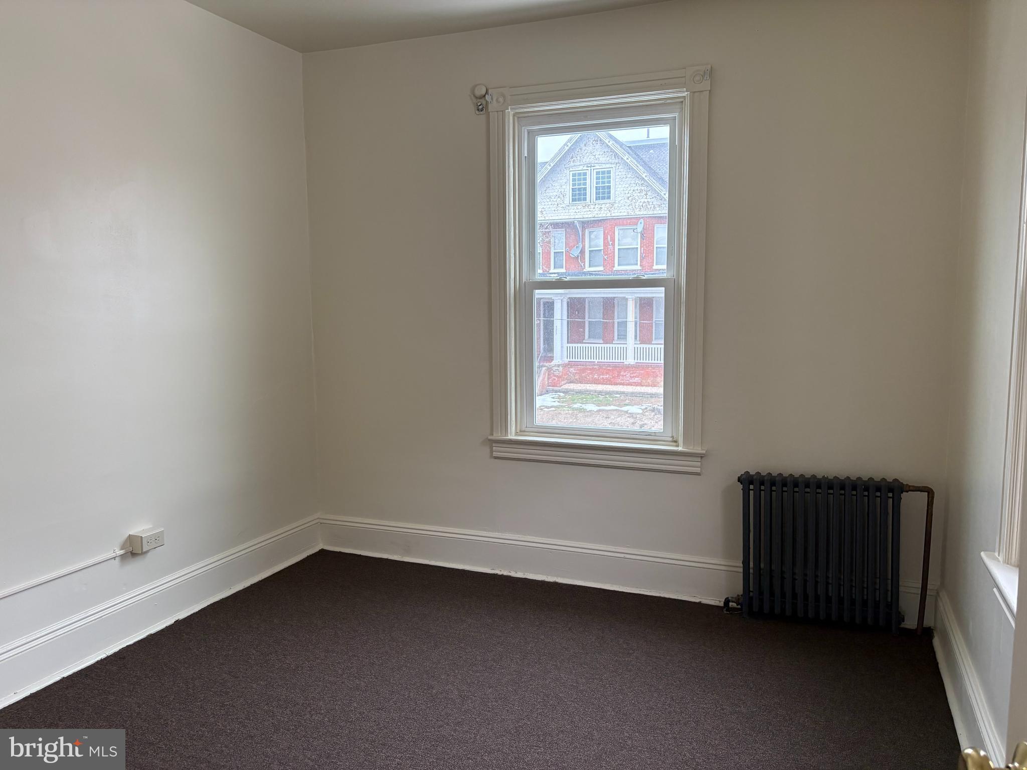330 East Chestnut Street Coatesville, PA 19320 - Photo 2 of 17 an empty room with a window