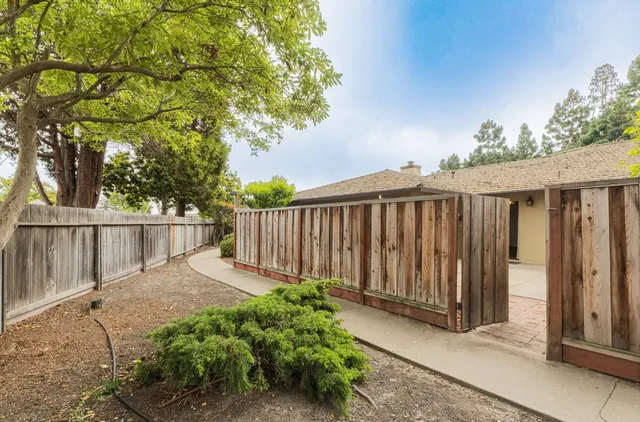a view of a wooden fence