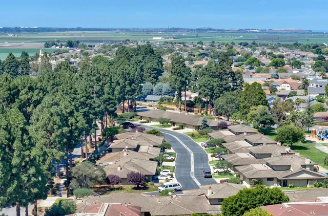 an aerial view of a city with lots of residential buildings
