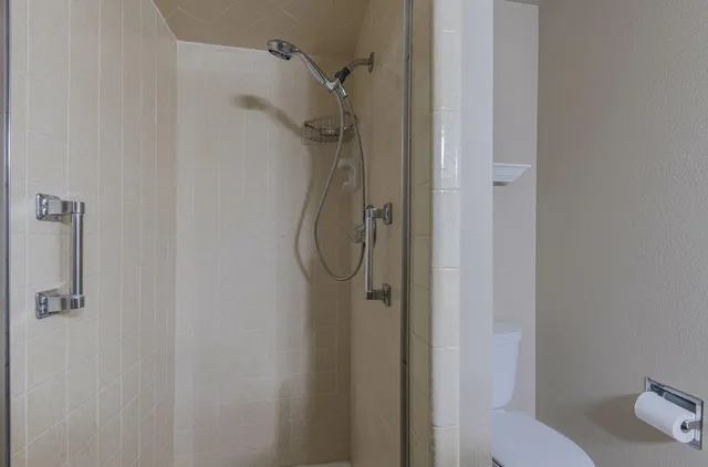 a view of a room with racks on the wall