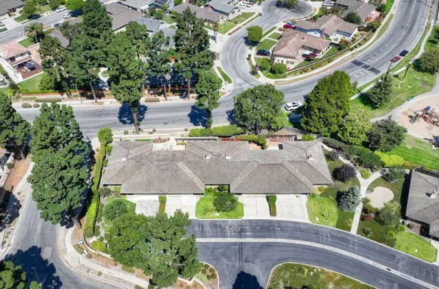 an aerial view of a house with a garden