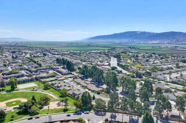 an aerial view of residential house and outdoor space