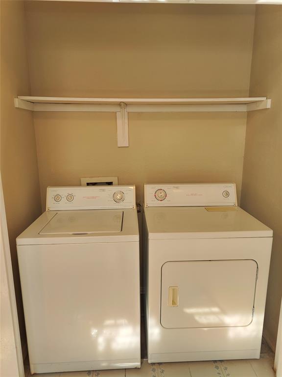4748 Old Bent Tree Lane, Unit 207 Dallas, TX 75287 - Photo 15 of 20 a utility room with dryer and washer