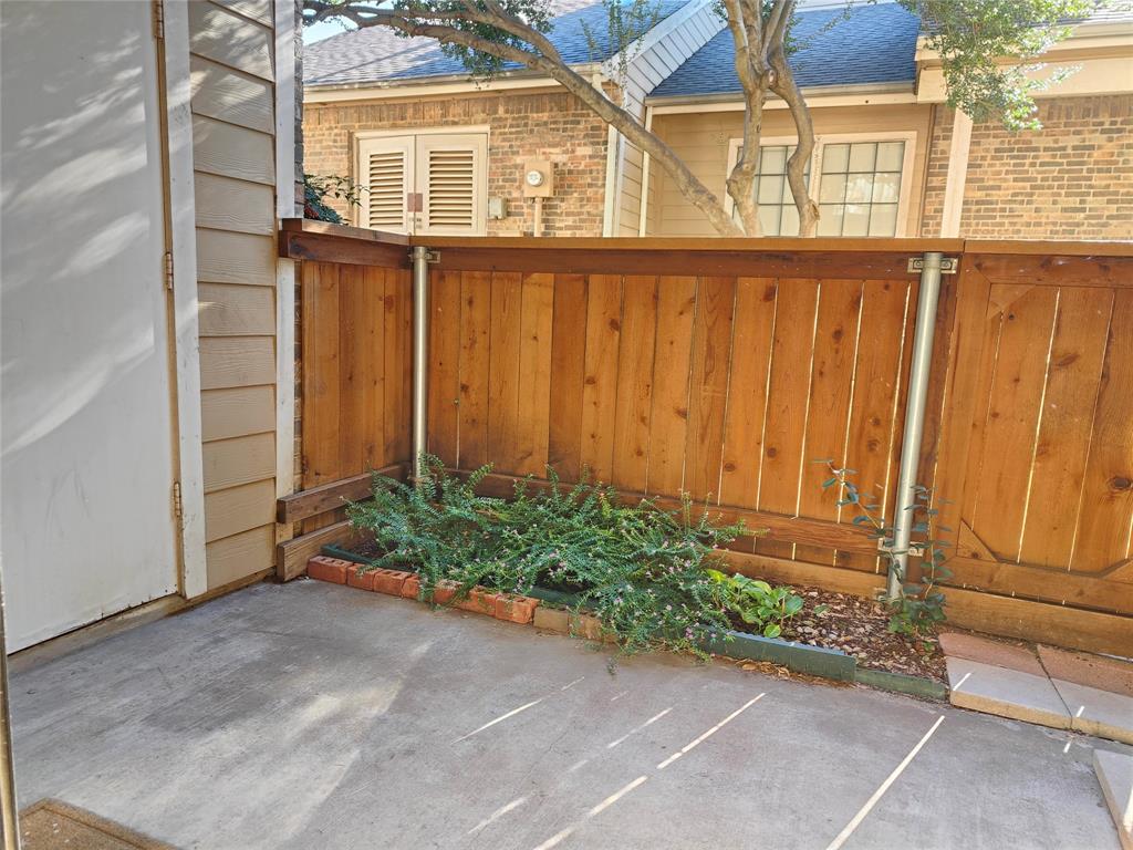 4748 Old Bent Tree Lane, Unit 207 Dallas, TX 75287 - Photo 16 of 20 front view of a house with a window