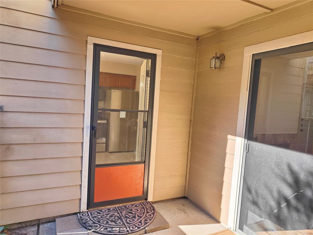 4748 Old Bent Tree Lane, Unit 207 Dallas, TX 75287 - Photo 19 of 20 a view of front door