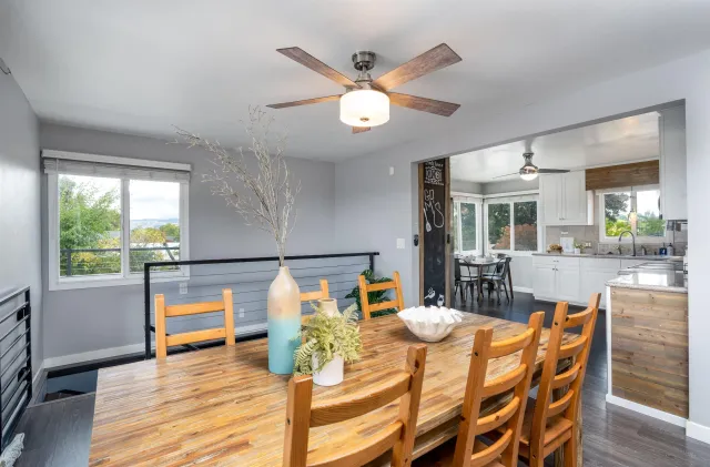 a view of a dining room with furniture window and wooden floor