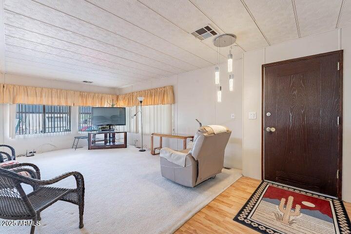 201 South Greenfield Road, Unit 142 Mesa, AZ 85206 - Photo 15 of 53 a living room with furniture and a window