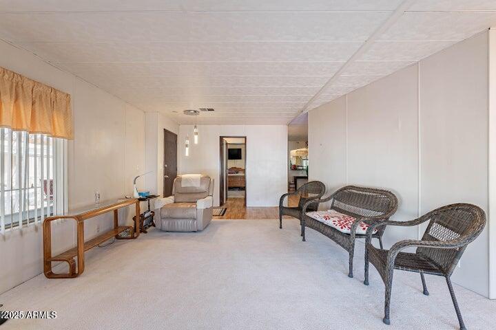 201 South Greenfield Road, Unit 142 Mesa, AZ 85206 - Photo 17 of 53 a room with gym equipment and large windows