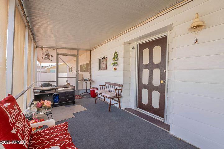 201 South Greenfield Road, Unit 142 Mesa, AZ 85206 - Photo 36 of 53 a living room with furniture and a window
