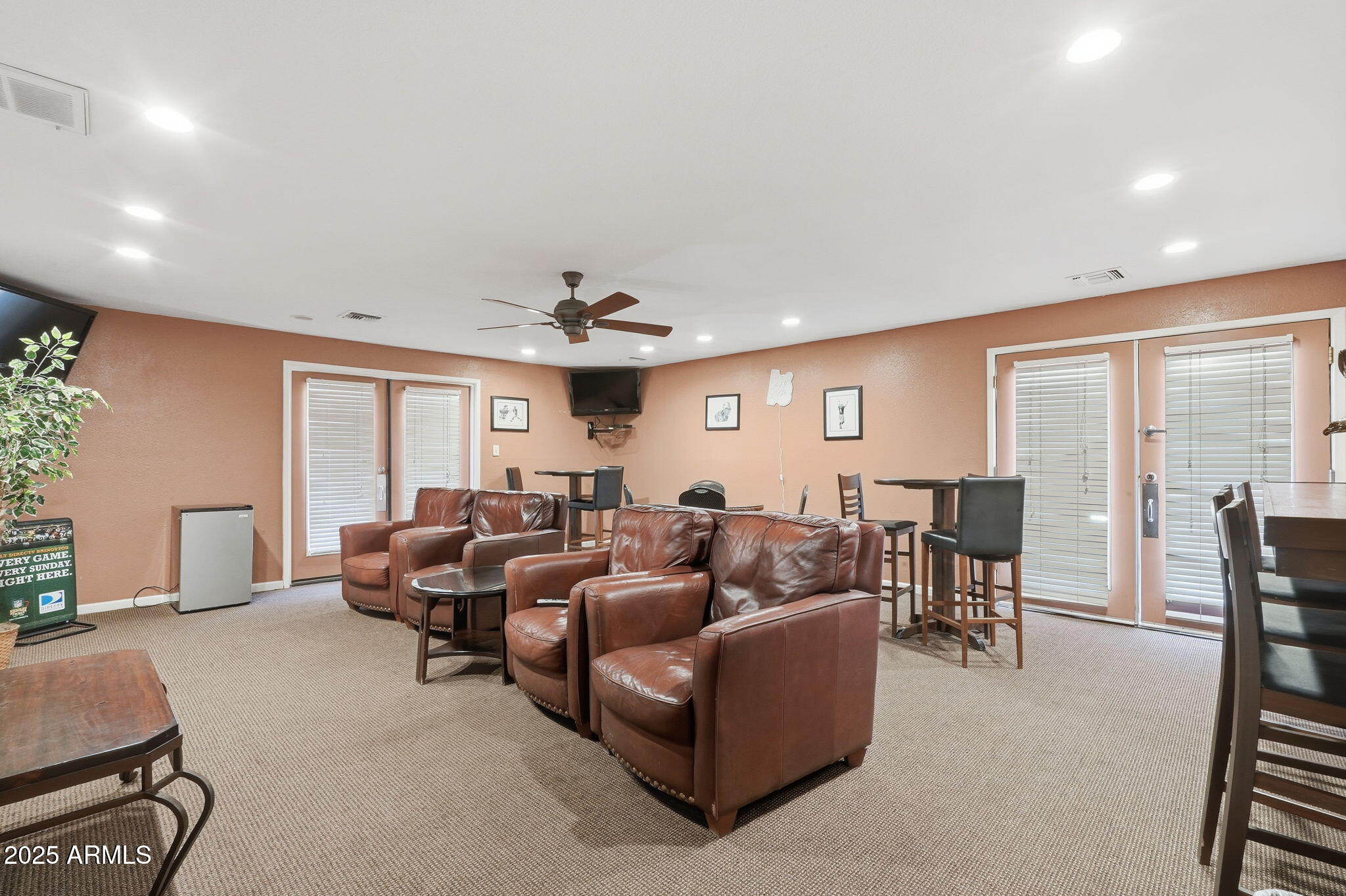201 South Greenfield Road, Unit 142 Mesa, AZ 85206 - Photo 44 of 53 a living room with furniture and a large window