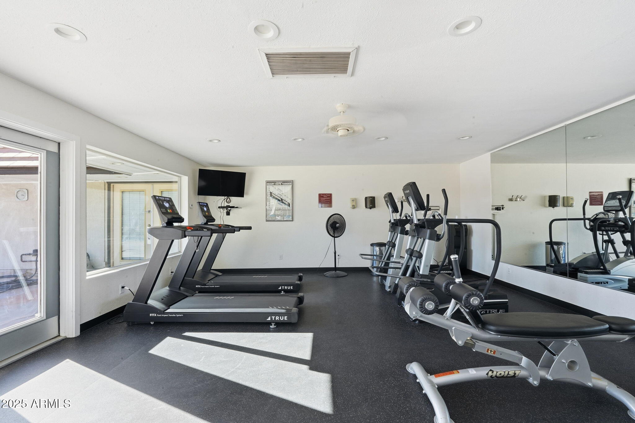 201 South Greenfield Road, Unit 142 Mesa, AZ 85206 - Photo 46 of 53 a view of a room with gym equipment