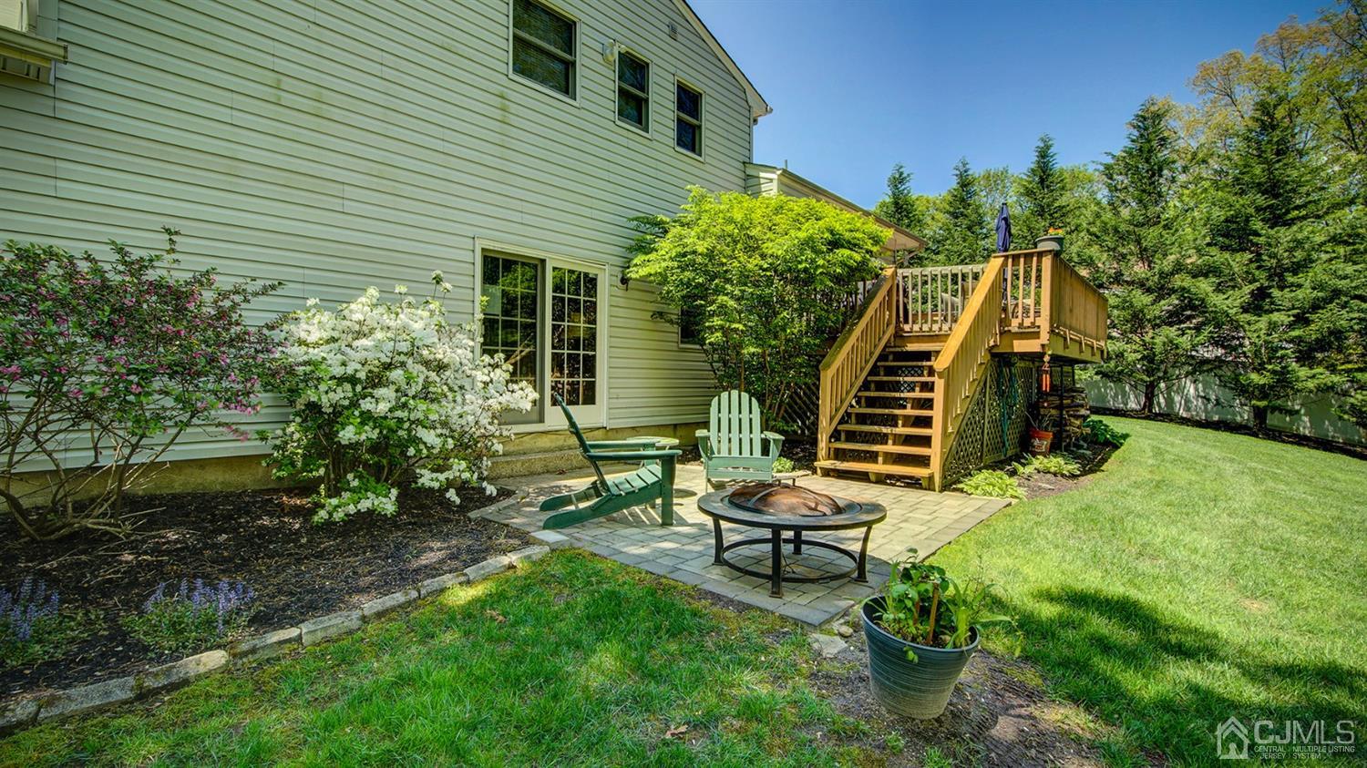 9 Tremblay Road East Brunswick, NJ 08816 - Photo 2 of 25 a backyard of a house with seating space