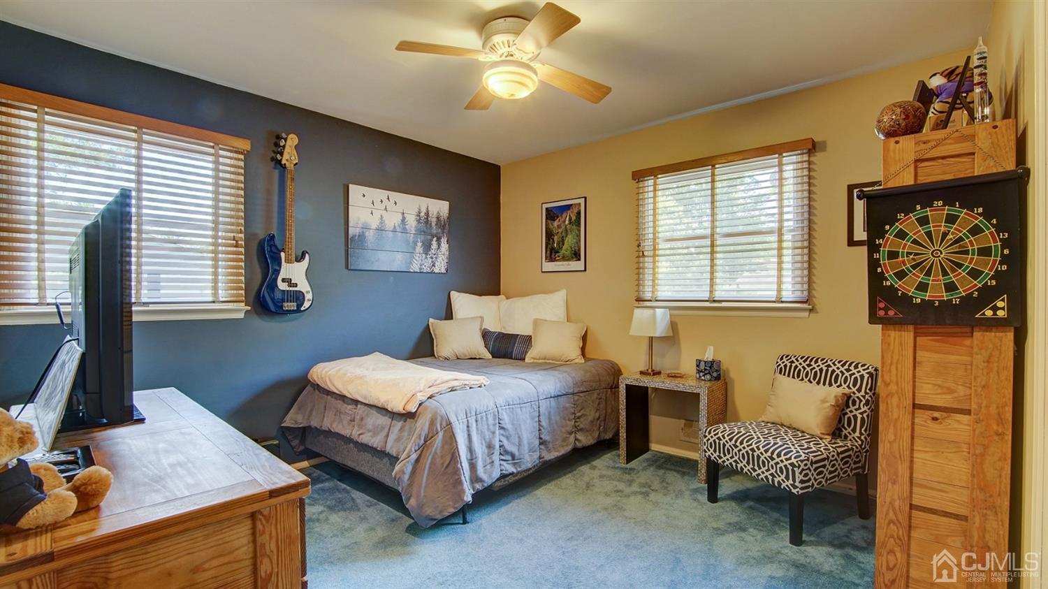 9 Tremblay Road East Brunswick, NJ 08816 - Photo 11 of 25 a bedroom with a bed and a couch